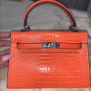 Hermes mini Kelly croc with crossbody